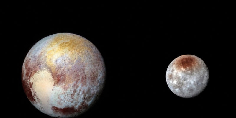 Charon’s Red Polar Cap Is Built From Pluto’s Own Escaping Atmosphere